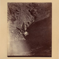 James Sibley Watson with dead big-horned sheep in gully<br />
