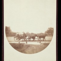 Horse-drawn cart with unidentified driver<br />
