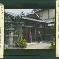 3046. Japan. Dwelling, Two Women Standing at Entrance; Lantern (1924) 