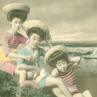 1106. [Three women, seaside backdrop]